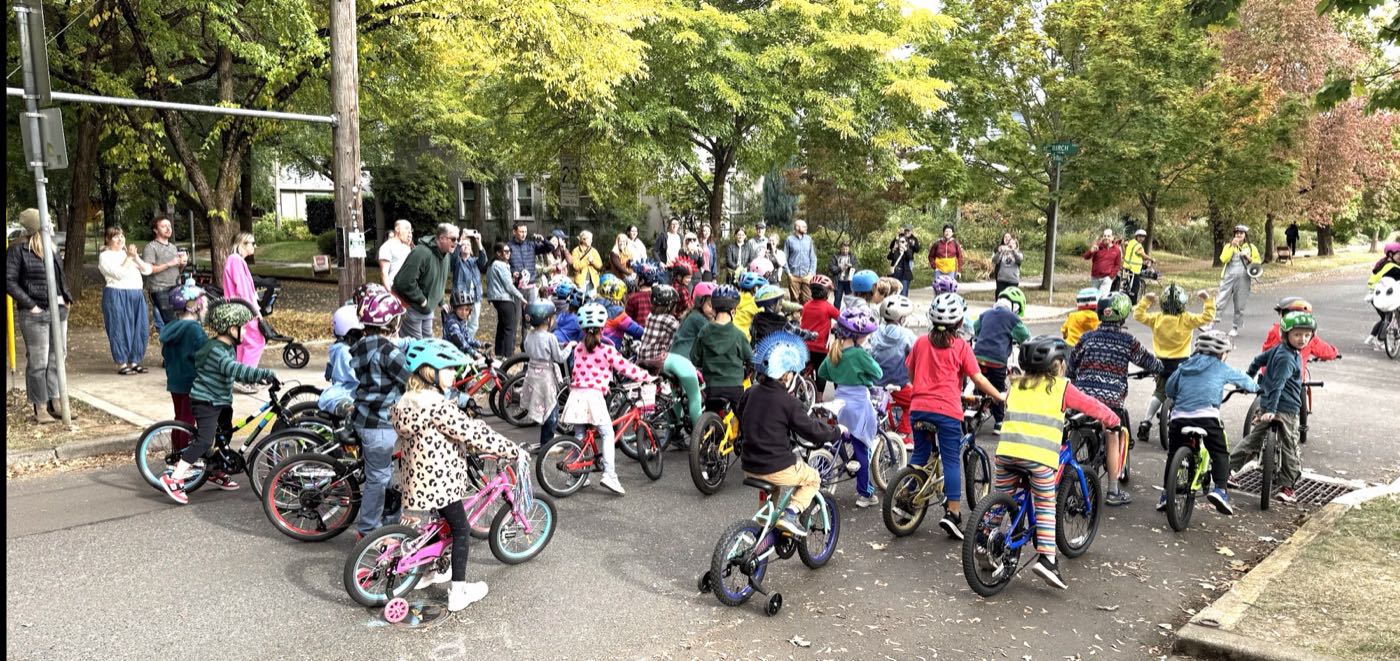 Dozens of kids on bikes lined up with their families for the Tour de Ladd